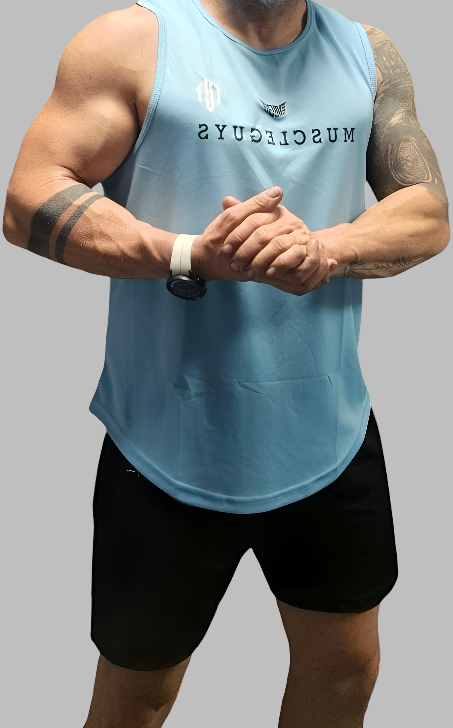 Person wearing a light blue sleeveless shirt with branding on a gray background